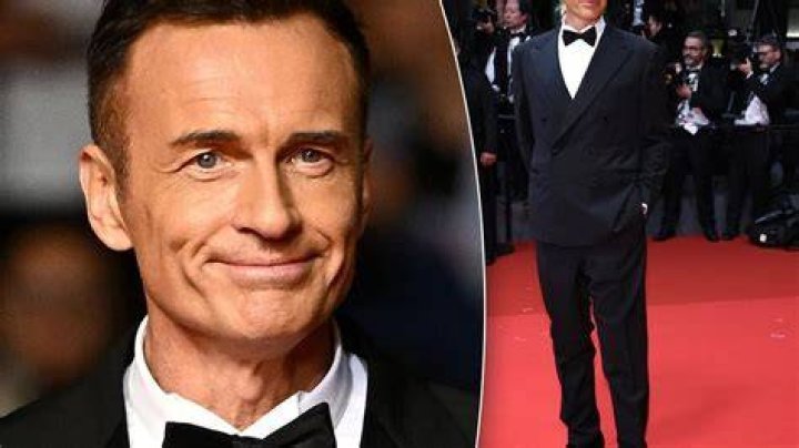 Julian McMahon sports a very bronzed look as he steps out with Kelly