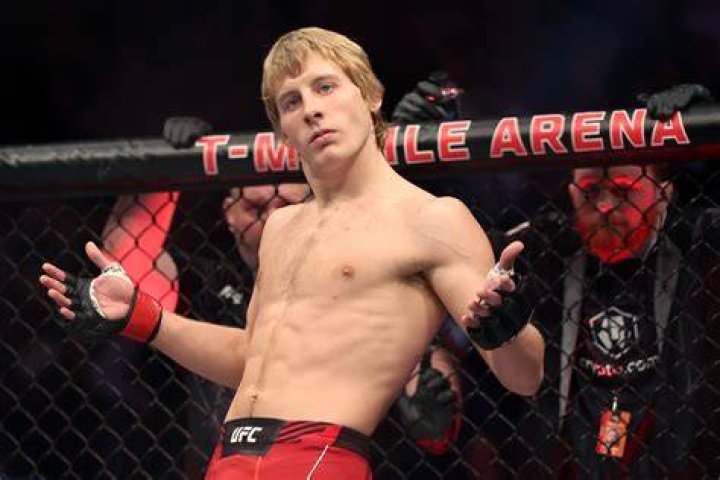 Paddy Pimblett's chic Looks like a geeky incel kid standing with his